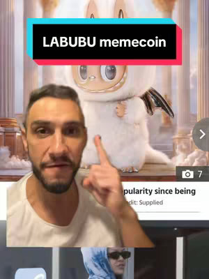 A man with a beard is pointing at a cartoon character in front of a social media screen. The cartoon character is white, with large eyes and black wings, and is in front of a classical building background, with text overlays at the top.