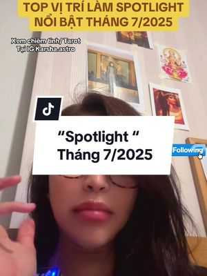 The cover image features a woman with dark hair, glasses, and full lips. Above her, a yellow banner displays text, and a white background with the TikTok logo and a text box that says "Spotlight Tháng 7/2025" is present. Above the woman are several framed decorative images on a beige wall. The style is casual and the lighting appears natural.