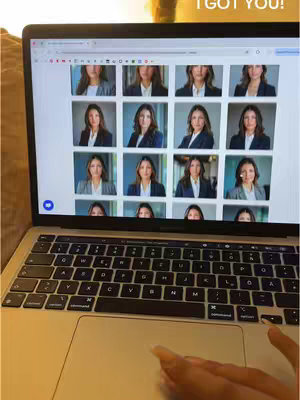 The cover image shows a laptop displaying a screen filled with headshots of a woman, arranged in a grid. The laptop is open on a light surface, with the keyboard visible. A hand, with long, manicured nails, rests near the trackpad. The background is blurred suggesting indoor setting.