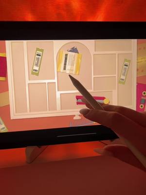 A hand with long nails points to a computer screen displaying a tidy room with puzzle pieces. The scene is lit by a warm, reddish glow, and the overall aesthetic is clean and minimalist.