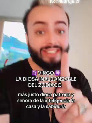 The cover image features a man with fair skin, light highlighted hair and a beard, pointing his index finger up towards the viewer. Text overlays describe Virgo, using a stylized font with multiple lines of text and astrological symbols. The background seems to be an interior, and the man's pose and expression indicate he is speaking directly to the audience.