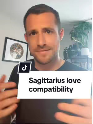 A man with fair skin is centered in the frame, looking towards the camera. He is wearing a black shirt, with short, dark hair. A block of text with the words 'Sagittarius love compatibility' appears on a white background at the bottom of the screen.
