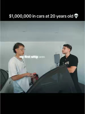 The image shows two young men in a well designed room. Text at the top states "$1,000,000 in cars at 20 years old". The man on the left has short, light brown hair, a white t-shirt, and glasses. The man on the right is black with a beard and is wearing a black t-shirt. The foreground includes a car.
