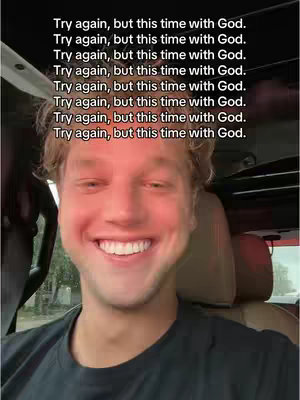 A smiling young man with blonde hair is seated in a car. The background is blurred, and the main focus is on his face and the words "Try again, but this time with God" repeated multiple times in a white font above him.