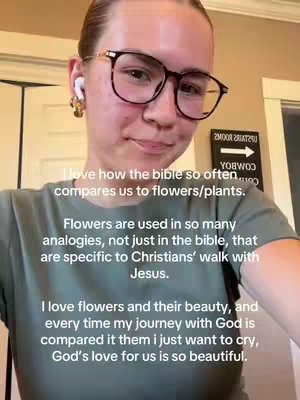 A young woman with glasses and earbuds is filming herself from a close angle. Text overlays the image, and the background is blurred. The woman wears a green t-shirt and has her hair pulled up. A sign is visible in the background with arrows. The text over the image includes religious references and talks about flowers and plants.