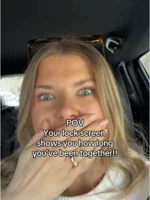 A selfie-style shot taken inside a car shows a woman with blonde hair looking directly at the camera. She has sunglasses perched on her head. The hook text overlays her face, with text appearing in a casual, modern font. Her hand is up to her mouth. The lighting appears to be natural.