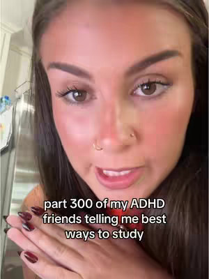 A close-up shot of a woman with long, dark hair and a nose ring, looking directly at the camera with a slight smile. Her hands are clasped in front of her, and text overlays are present.