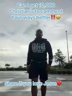A man wearing a black hoodie and shorts is standing in what appears to be a parking lot or open space. Overlaid text encourages interaction.