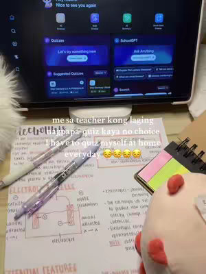 The image shows a person's study setup, with the focus on notes and a tablet displaying an app named "KnowUnity". There are pens, a notebook, sticky notes, and a stuffed animal. The tablet screen shows an app interface with quiz and learning functionalities.