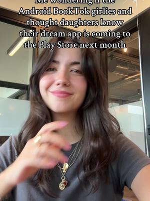 A cover image featuring a young woman with long brown hair, smiling and looking at the camera. A text overlay at the top of the image states, "Me wondering if the Android BookTok girlies and thought daughters know their dream app is coming to the Play Store next month," indicating a promotional video about an app.