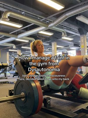 The cover image shows a woman positioned on a gym exercise bench. She is using a leg press machine in an effort to train her legs. Text overlays describe the video topic. The gym setting is in focus showing a functional fitness area with weight racks and overhead beams.