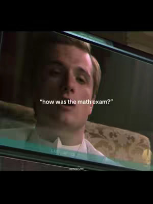 The image shows a man looking out of a car window. Text overlayed on the image reads 'how was the math exam?'. The background consists of a car interior with patterned upholstery.