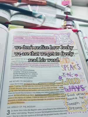 A photograph of an open Bible with highlighted text and handwritten notes, alongside various pens and markers. The page is extensively marked, and some text is highlighted with pink highlighter. Text overlays the image.