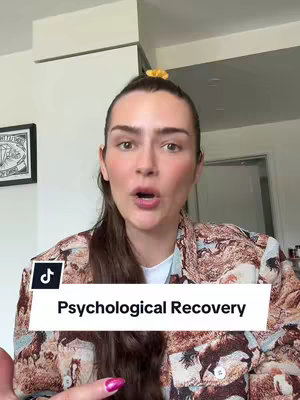 A woman with long brown hair and makeup is centered in the frame, looking directly at the camera with a slightly open mouth. She wears a floral patterned shirt. Overlaying her are multiple text boxes and the TikTok logo. The backdrop is a room.