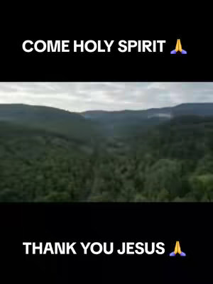 The image features a landscape of rolling green hills and mountains under a cloudy sky. The top and bottom thirds of the image are black, with white text overlays. The text at the top reads 'COME HOLY SPIRIT' and includes a praying hands emoji. The text at the bottom reads 'THANK YOU JESUS' and includes a praying hands emoji.
