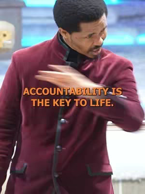 The cover image features a man in a burgundy jacket, gesturing with his right hand while looking toward the left. Text overlayed in the center says, "ACCOUNTABILITY IS THE KEY TO LIFE." The background appears to be a modern setting with a blue and white pattern.