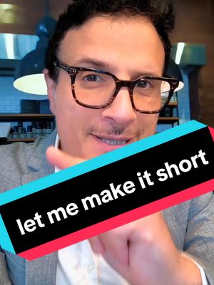 A man with glasses smiles, pointing at the camera with one hand. A colorful banner across the bottom says "let me make it short". The background is indistinct, likely indoors.