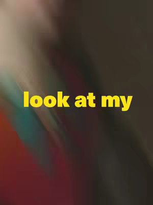 The cover image has a blurred background with a gradient of colors including red, brown, and teal. Overlaid on the background is large yellow text that reads "look at my".