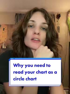 A woman with curly brown hair is centered in the frame, resting her chin on her hand. A blue and white rectangular text overlay is positioned at the bottom.