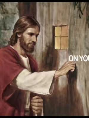The image depicts a man resembling Jesus in front of a wooden door. He has long brown hair and a beard, wears white and red robes, and is reaching out to knock on the door's handle. The background suggests a building interior, with a window partially visible to the right. The overall tone is religious and illustrative.