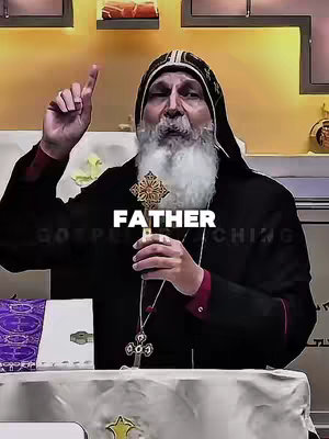The cover image shows an older man with a white beard, wearing a black robe and a head covering. He is gesturing upwards with his right index finger while holding a cross in his left hand. The background is a blurred interior with religious symbols. Overlay text "FATHER" is prominently displayed. Colors are muted with focus on the man's face and the cross's detail.