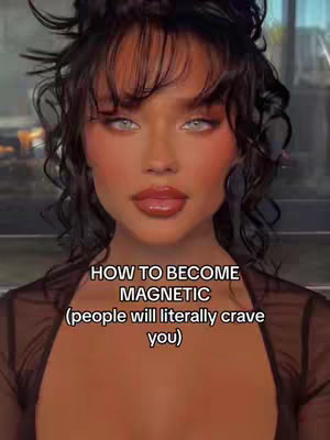 The image is a close-up of a woman's face. She has dark curly hair, heavy makeup, and a glossy lip. The text overlay says 'HOW TO BECOME MAGNETIC (people will literally crave you)'. The overall composition is focused on her facial features.