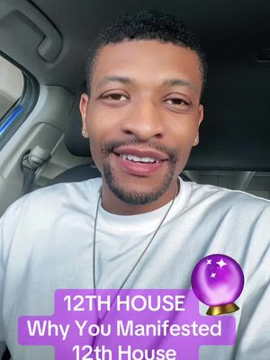 A selfie-style shot featuring a Black man in a car. He is smiling, and text overlays are present with a purple, glowing, crystal ball illustration.