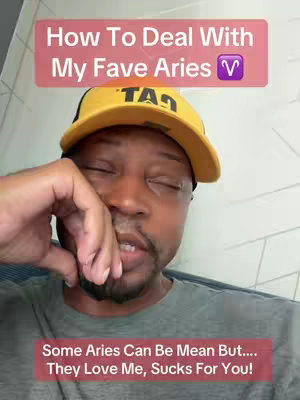 A man with a yellow cap and a gray shirt is featured in a selfie-style video thumbnail. Text overlays include a title about dealing with Aries and a statement about Aries' love for the creator. The man appears to be reacting with a thoughtful pose.