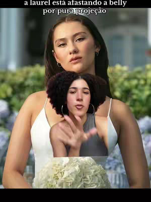 The cover image presents a layered composition. The main layer features a woman with dark hair, wearing a white top, and looking towards the upper left corner with a contemplative expression. Overlayed on her chest and slightly below is a younger woman's face, making a hand gesture and looking at the viewer. Behind these figures there is a blurred natural setting. Above the main figure is a text overlay in a sans-serif font. The colors are natural, with skin tones and a muted background.