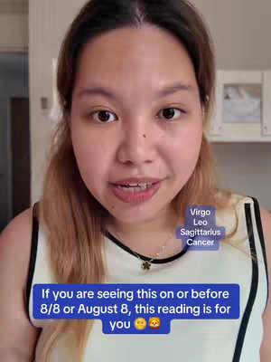 The cover image is a selfie-style shot of a young woman, framed from the chest up. She has brown or light-brown hair pulled back into a side ponytail. She is wearing a white tank top with black trim and a delicate necklace with a small pendant. Her expression is a mild smile with her lips slightly parted, looking directly at the camera. Behind her are the blurred details of a room interior. There are overlaid text elements: a list of zodiac signs in a small purple rectangle and a white text box containing a message above the bottom.