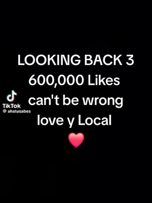 A minimalist cover image with a black background. White text is centrally aligned, and a pink heart icon is positioned below. The upper section includes the phrase "LOOKING BACK 3", followed by "600,000 Likes" and "can't be wrong". At the bottom appears 'love y Local'. A TikTok logo is placed in the lower-left corner.