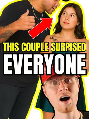 A brightly lit thumbnail featuring three individuals. The top two-thirds feature a man and a woman. The man points with a thumbs up and the woman looks at him. Below in the lower right corner is a man with glasses with an open mouth. A large red arrow is pointing towards a couple. The text over the couple is in a bold yellow font.
