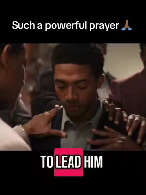 The cover image shows a scene from a movie. A young Black man with short hair is the central figure. He has his eyes closed and is surrounded by other people's hands, suggesting support or prayer. Text overlays include "Such a powerful prayer" and "TO LEAD HIM". The image has a dark background with a warm color palette, highlighting the central figures.