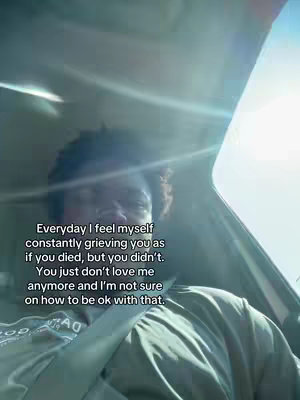 The cover image shows a close-up selfie of the creator inside a car. The creator, a person with a dark complexion and curly hair, is seated with the car's interior visible around them. The lighting is bright from a window, creating lens flare. The background suggests a daytime scene, with text overlayed on the image expressing personal emotion.