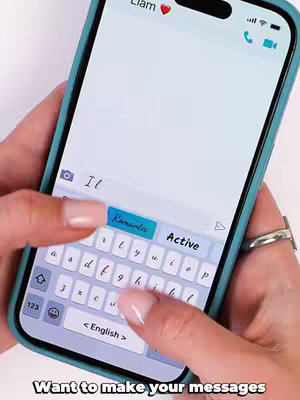 A phone screen with a chat message appearing. The screen is held by a person with manicured nails, with the option to select "Romantic" or "Active"
