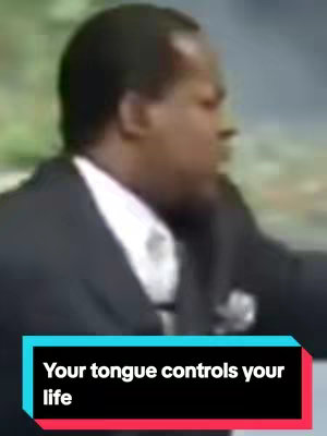 The image displays a man wearing a black suit and white shirt speaking. The lower third of the image contains a text overlay that says: "Your tongue controls your life". The colors in the image are generally muted.