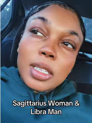 A close-up shot of a Black woman looking slightly to the side with a somewhat quizzical expression. She appears to be in a car, with the headrest visible in the background. The foreground is dominated by her face, and a text overlay at the bottom reads 'Sagittarius Woman & Libra Man'.