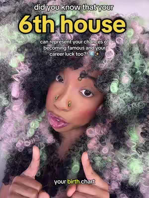 The image features a close-up of a person with multi-colored curly hair. The person has multiple face piercings and is smiling with their mouth open, showing their teeth. Text overlays are added.