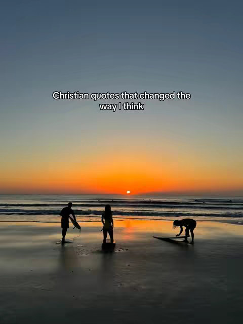 A sunset beach scene with three silhouetted figures on the shore. The sky transitions from blues to oranges and yellows, with the sun low on the horizon. The figures appear to be surfers or people carrying surfboards. Text overlayed at the top indicates a theme of Christian quotes.