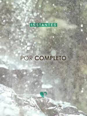 The image features a waterfall cascading from a blurred background, with water droplets creating a hazy effect. A rectangular green banner with white text that says "INSTANTES" appears at the top. Below, in large, bold white letters, it says "POR COMPLETO". At the bottom, there is a rock formation and a green and teal heart-shaped symbol is placed at the bottom middle.