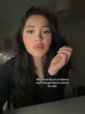 The cover image features a woman facing the camera in a well-lit, indoor environment. She has dark hair that’s partially up, and she’s wearing makeup. The background is softly blurred, with indications of additional lighting or decorative elements.