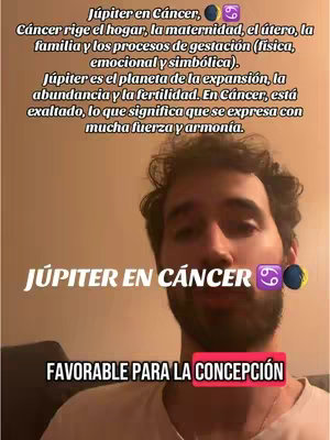 A selfie-style video cover. The central focus is on a man with a beard against a blurred, neutral background. Text overlays include the title 'JUPITER EN CÁNCER' in white, bold letters over a purple symbol and white text. Another text segment reads 'FAVORABLE PARA LA CONCEPCIÓN' in a red box. The overall composition is simple, with a clear emphasis on text and the creator's face.