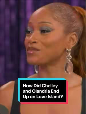 The cover image features a woman with light skin, styled hair, and visible eye makeup. The woman is wearing a dark top, with the scene appearing to be a studio setting, as indicated by the blurred background. The bottom of the image has a text overlay highlighted in blue and red, with a question asking how Chelley and Olandria ended up on Love Island.