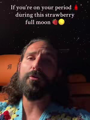 A man with long, dark hair and a beard is looking towards the camera. Above his head is text overlaid on a night sky background. The man is wearing a multi-colored knitted sweater. There is a Rolls Royce logo visible in the background.