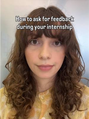 A selfie-style shot of a person with curly brown hair and bangs. The person is looking directly at the camera with a neutral expression. Text overlay across the top reads "How to ask for feedback during your internship."