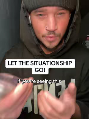 A man in a black hoodie and beanie is looking at the camera. White text on a white background is layered onto the image, saying 'LET THE RELATIONSHIP GO!'. Below it, more white text reads 'if you're seeing this'. The man's hands are visible, holding a clear orb.
