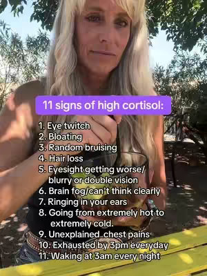 A woman is shown from the chest up, looking at the camera. She is holding a glass. A purple rectangle with white text is positioned above, listing signs of high cortisol.