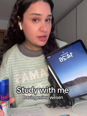 A young woman with long dark hair is centered in the frame, holding an open tablet. She is wearing a light green striped shirt and has a Red Bull can on the table in front of her. The text 'Study with me' and 'Bauingenieurwesen' are overlaid on the image.