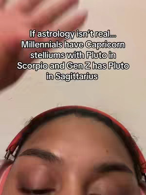 A selfie-style video with the creator's face in the bottom third, a hand in the upper left, and text overlays about astrology. The background is a soft, blurred gradient, and the focus is on the information presented.