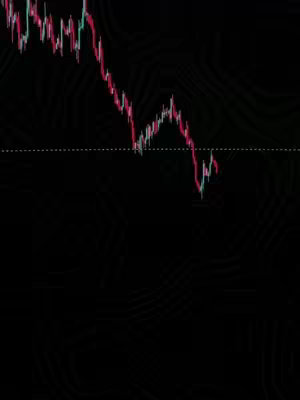 The image shows a dark background with a red and green line graph charting an apparent decline. The graph has a dotted white horizontal line.